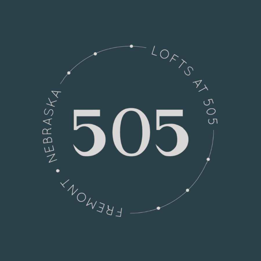 A graphic with the number 505 in the center and the words "Lofts at 505" written around the circle.